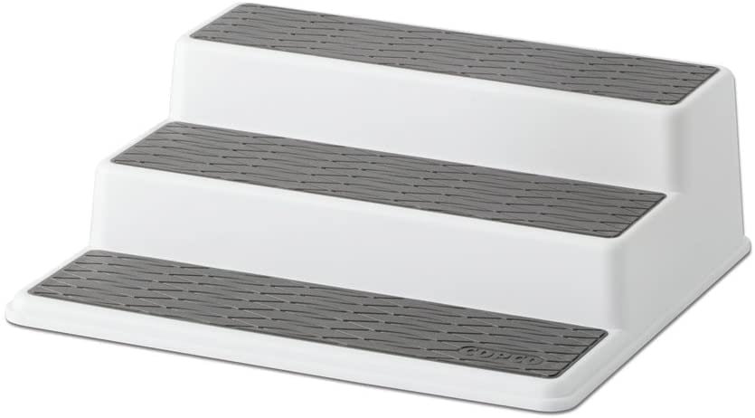Tiered shelf organizer for spices or canned goods.